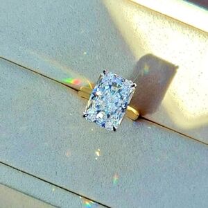 Solid 18k white and yellow gold 10ct radiant moissanite ring